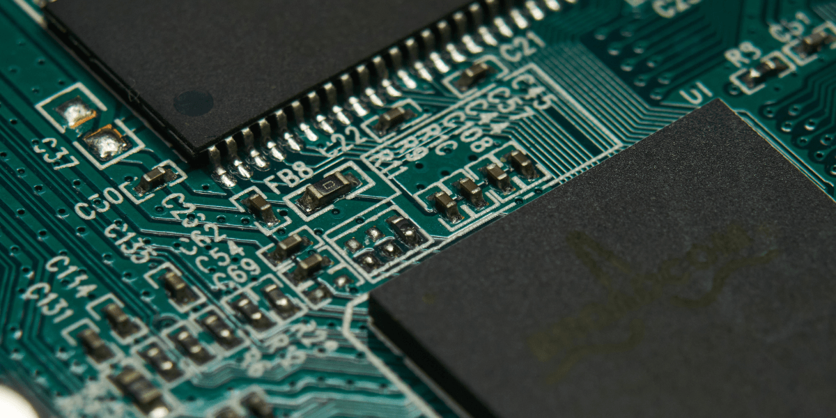 Close-up of a printed circuit board with various components and intricate connections
