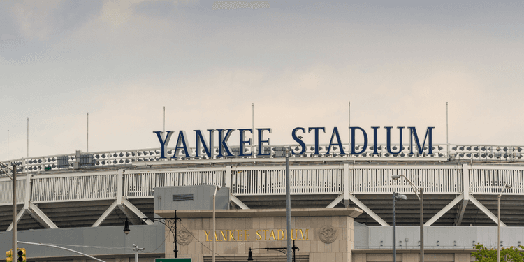 Exterior view of Yankee Stadium with its name prominently displayed on the facade