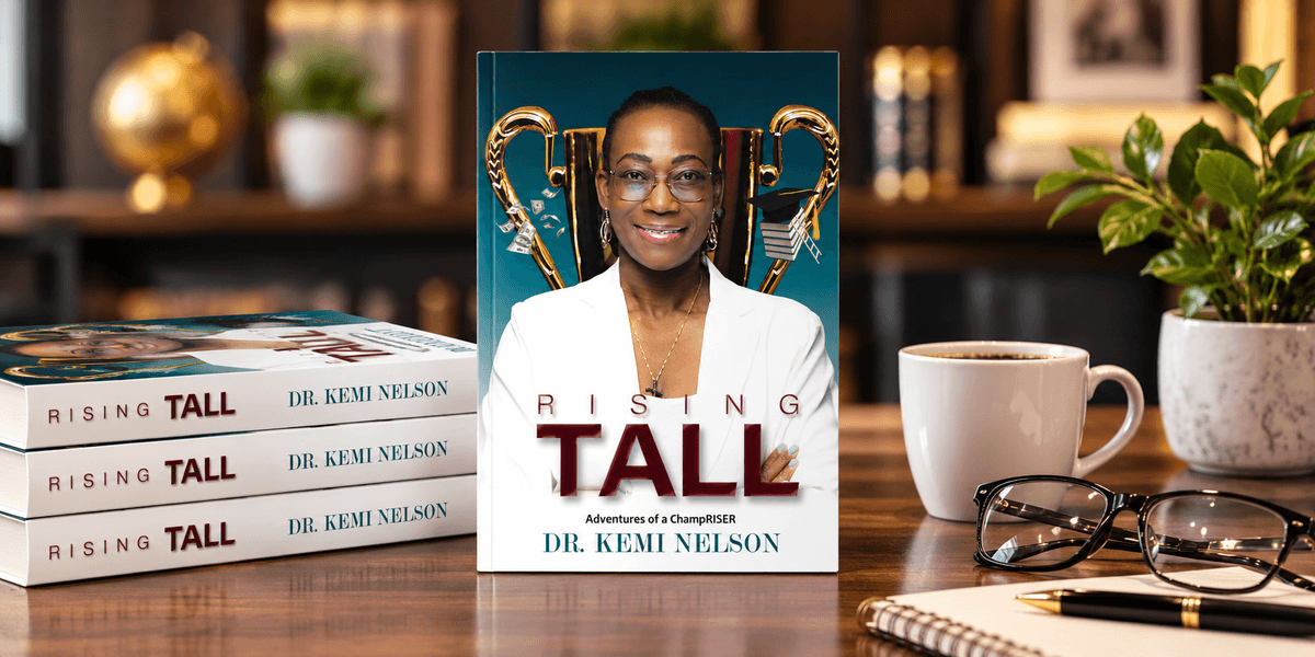 A book titled "Rising Tall" by Dr. Kemi Nelson displayed among coffee and glasses.