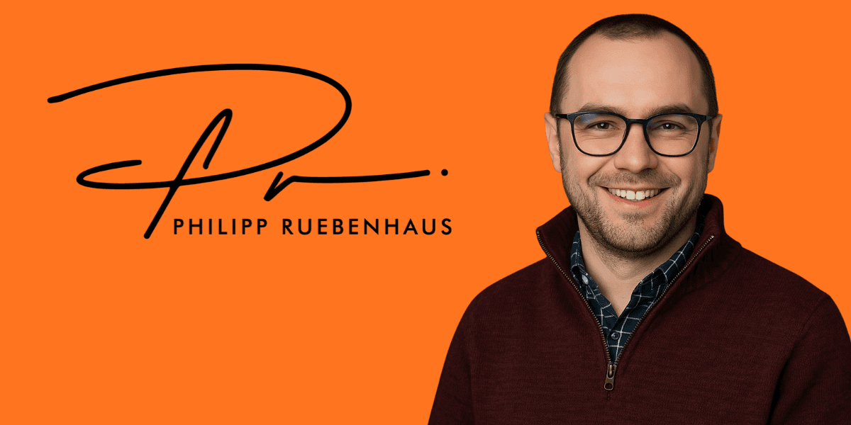 Man with glasses smiling against an orange background and signature logo displayed