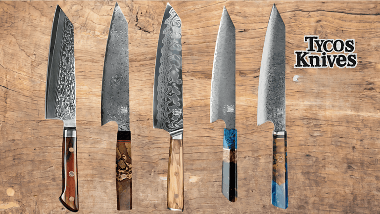 A collection of Tycos Knives featuring Damascus steel blades, showcasing precision craftsmanship, with intricate handles on a wooden background.