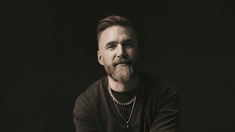 Portrait of photographer and podcast host Matt Jacob against a dark background promoting The MOOD Podcast: Conversations With Soul.