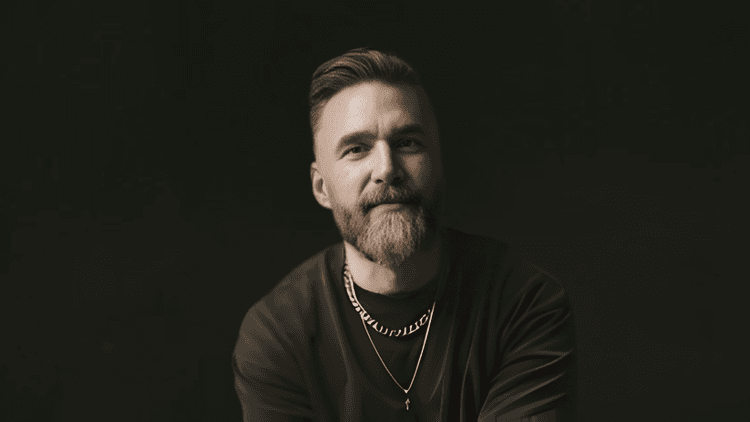 Portrait of photographer and podcast host Matt Jacob against a dark background promoting The MOOD Podcast: Conversations With Soul.
