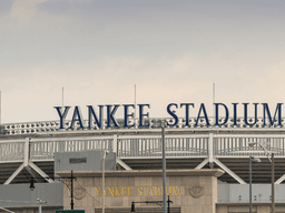 Exterior view of Yankee Stadium with its name prominently displayed on the facade