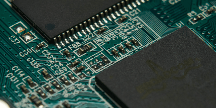 Close-up of a printed circuit board with various components and intricate connections