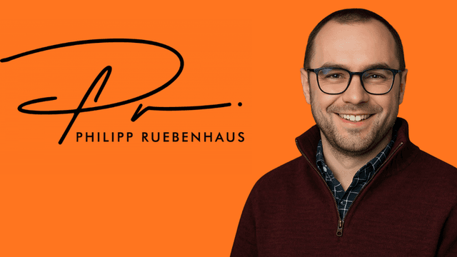 Man with glasses smiling against an orange background and signature logo displayed