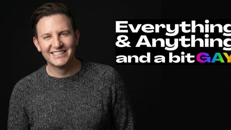 Smiling podcast host Zach Randles-Friedman beside “Everything & Anything and a bit GAY” podcast logo on a black background.