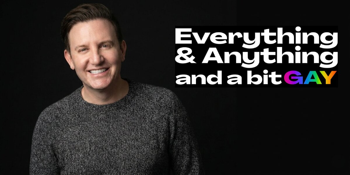 Smiling podcast host Zach Randles-Friedman beside “Everything & Anything and a bit GAY” podcast logo on a black background.