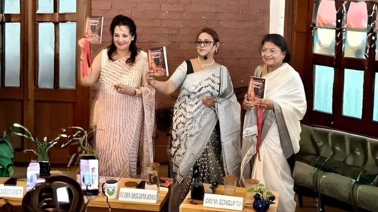 A book launch event for Aloka Dasgupta Niyogi’s debut novel "Inheritors of Silence," featuring the author and guests.