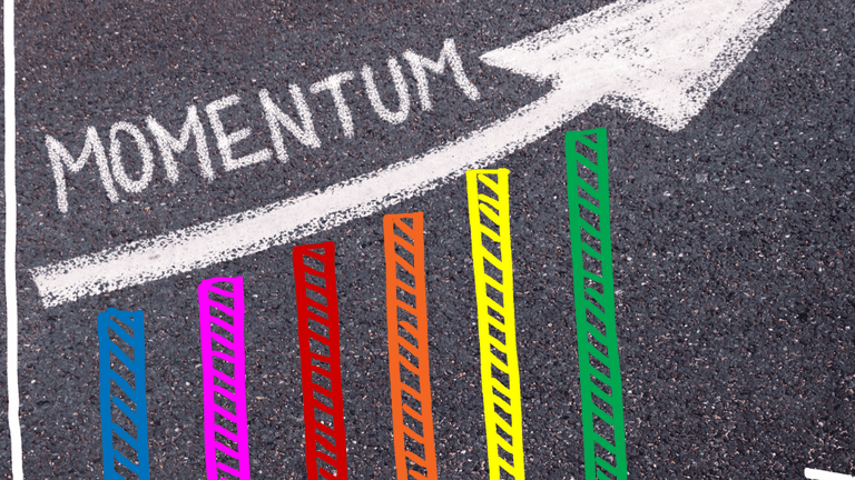 Upward arrow and colorful bar chart illustrating market momentum and business growth.