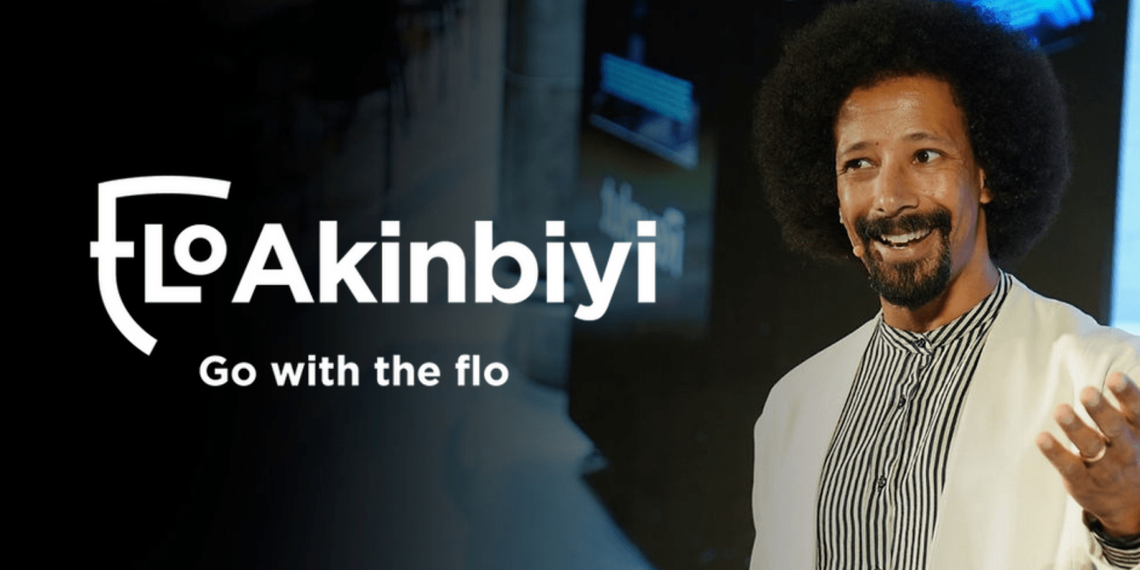 Flo Akinbiyi, dynamic communication coach, speaking at an event, empowering leaders to communicate confidently and effectively.