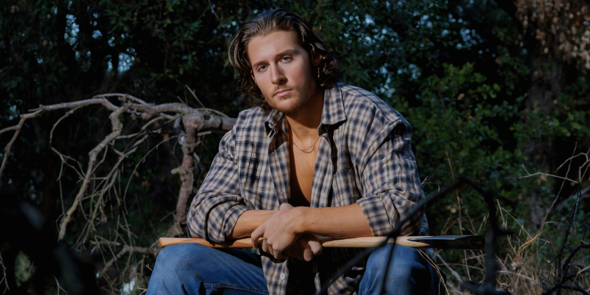 Actor Nate Mayes in nature, showcasing versatility and emotional depth in his creative journey.